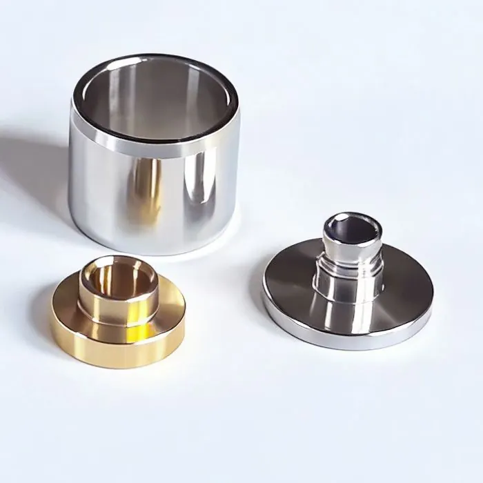 Flanged gold- and silver-coloured spacers